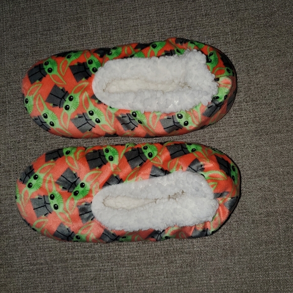 brand new (NWT) Accessories - Baby Yoda Slippers. Great for Star War fan! Fuzzy Interior.